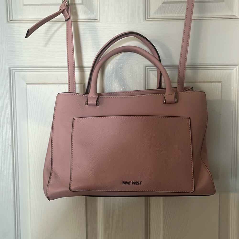 Light pink Nine West pocket book.